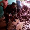 Anggota Koramil Subang bersama warga setempat saat membersihkan material longsoran.